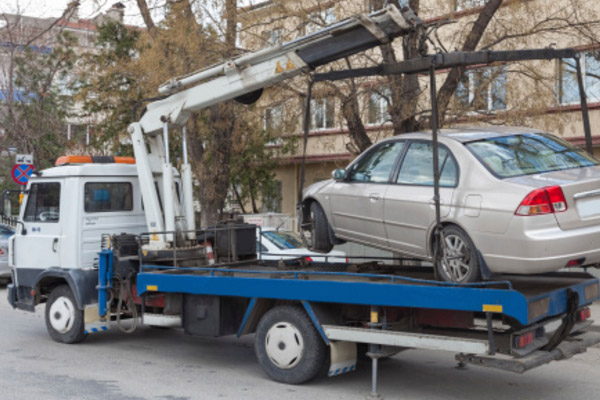Как загружают автомобиль на эвакуатор
